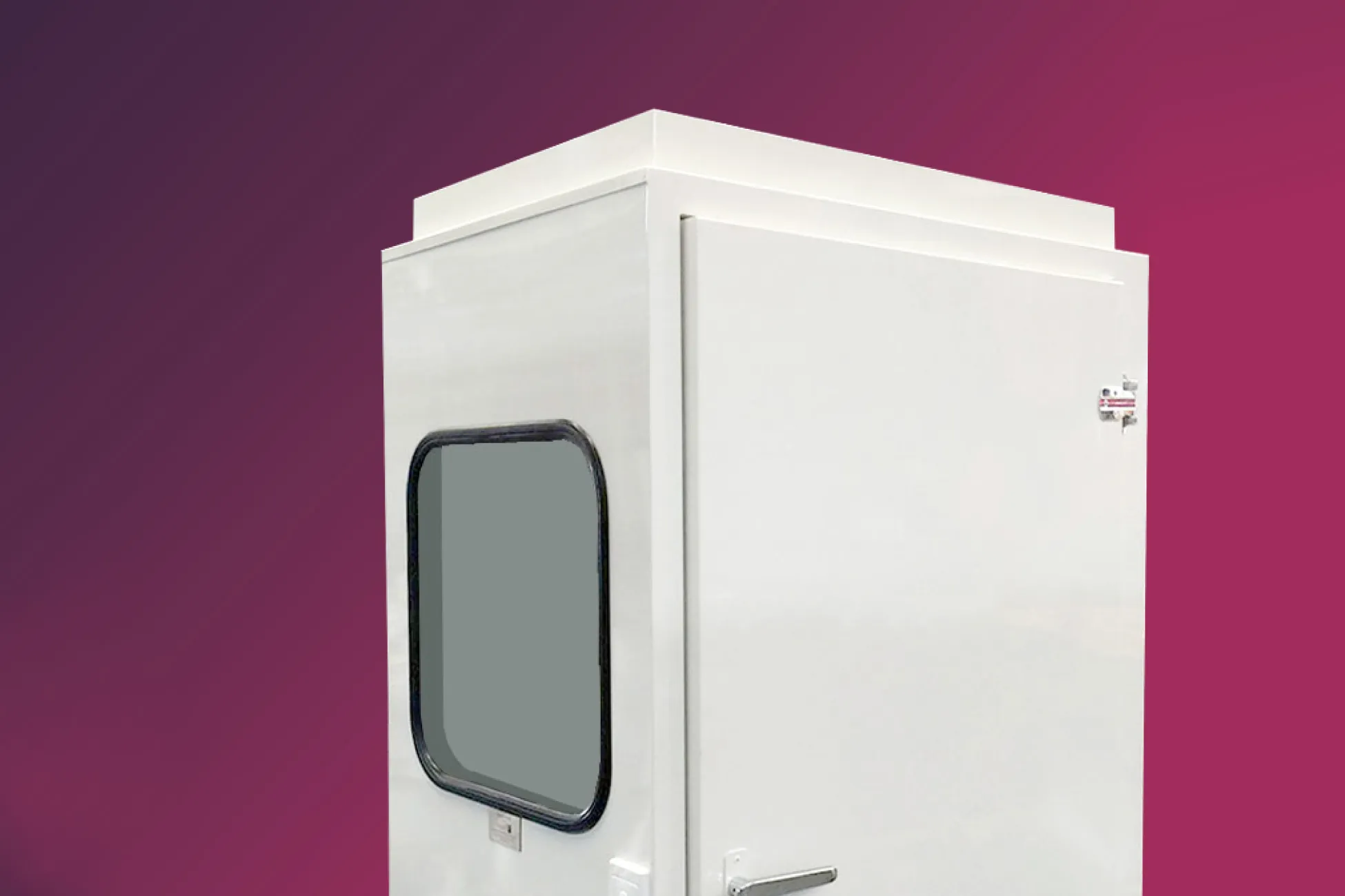 A white audiometric booth by The Hearing Company