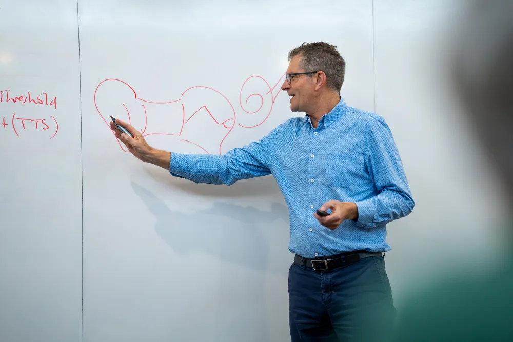 Glenn Johnson explaining an ear anatomy diagram