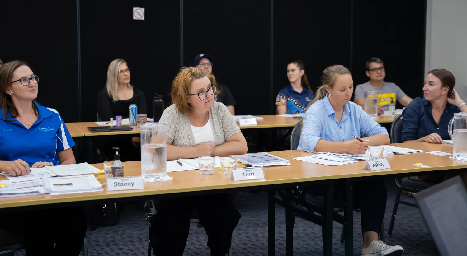 Students listening to a course in session