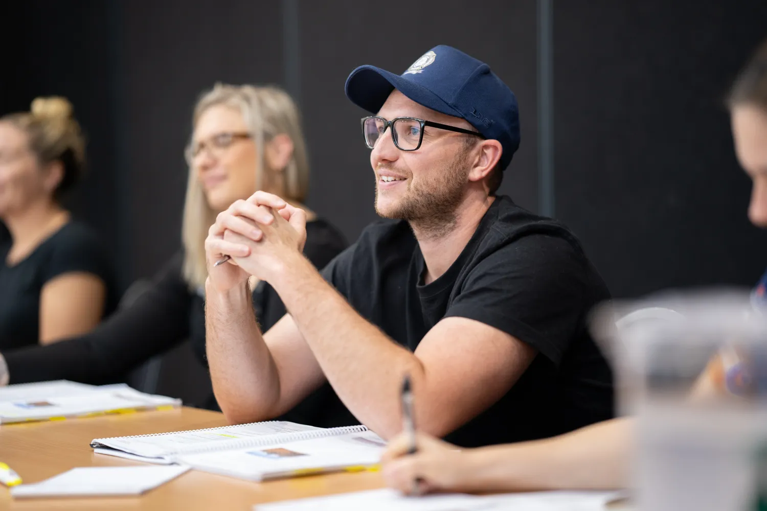 Student smiling and listening